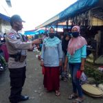 Sambangi Warga Pasar Kalibone,Ini Pesan Bhabinkantibmas Polsek Minasatene