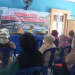 Bhabinkamtibmas Polsek Minasatene Hadiri Pembinaan Usaha Micro kecil Dan Ajak Warga Untuk Mengikuti Vaksinasi Covid-19