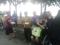 Berkah Ramadhan 1446 H: Lingkar Hijau dan PPDI Berbagi Nasi Dos kepada Masyarakat di Masjid Terapung