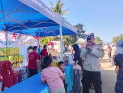 Bhabinkamtibmas Desa Kabba Amankan dan Pantau Kegiatan Pasar Pangan Murah di Lapangan Cangkoe